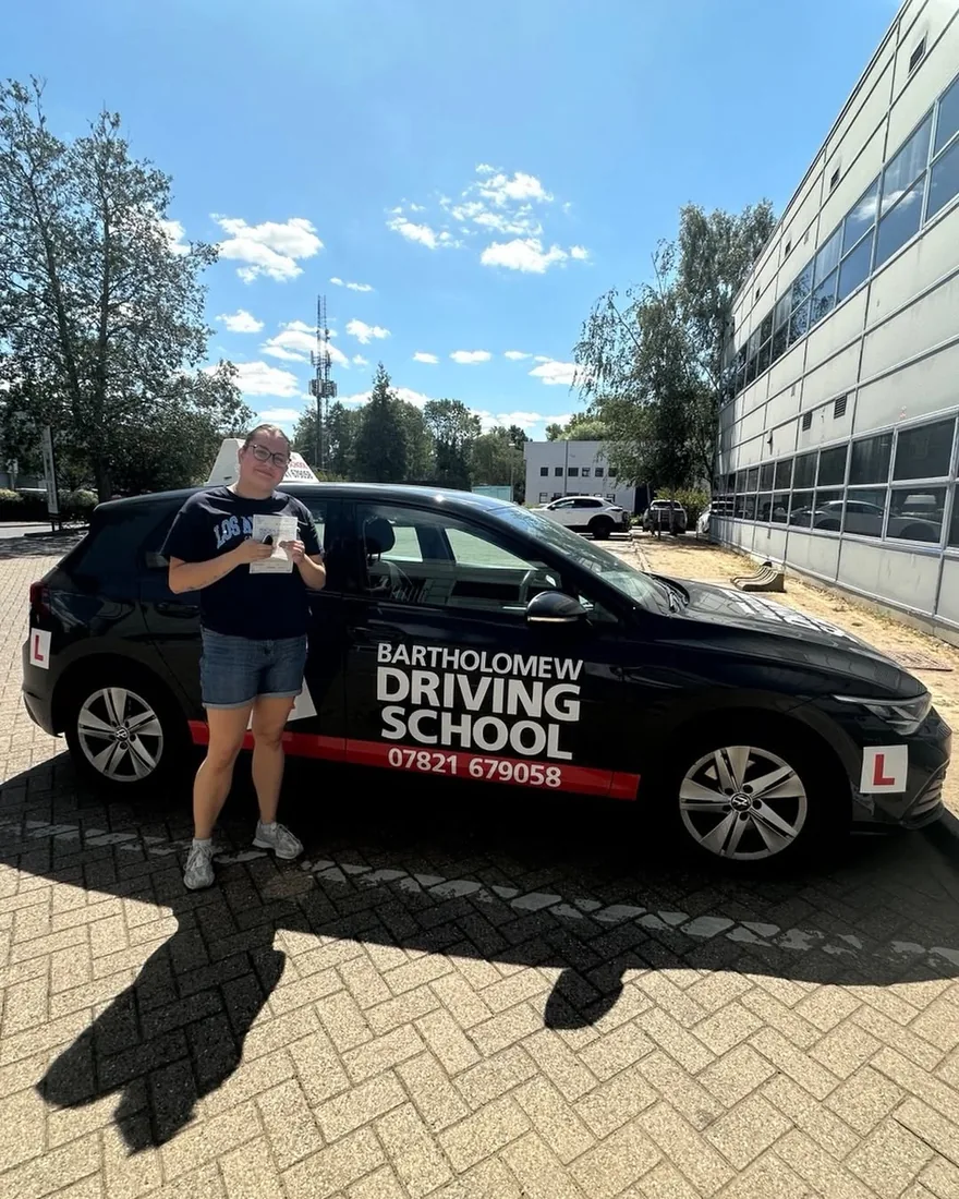 First-time pass photo with the school car
