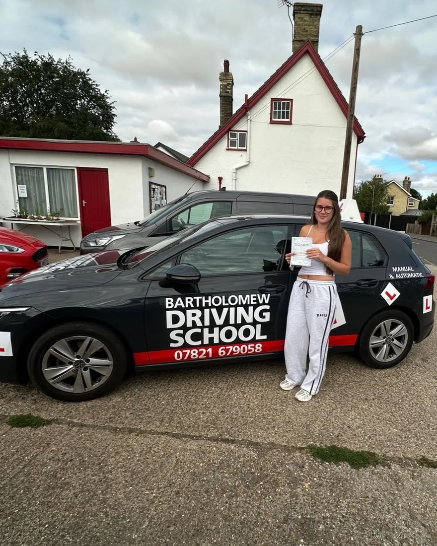 First-time pass photo with the school car