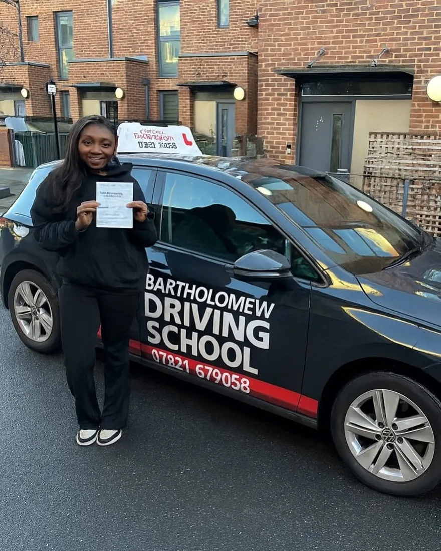 First-time pass photo with the school car