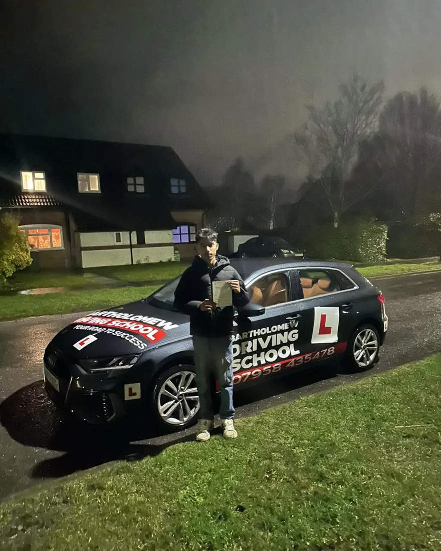First-time pass photo with the school car