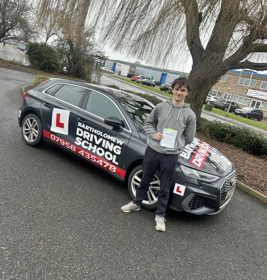 First-time pass photo with the school car