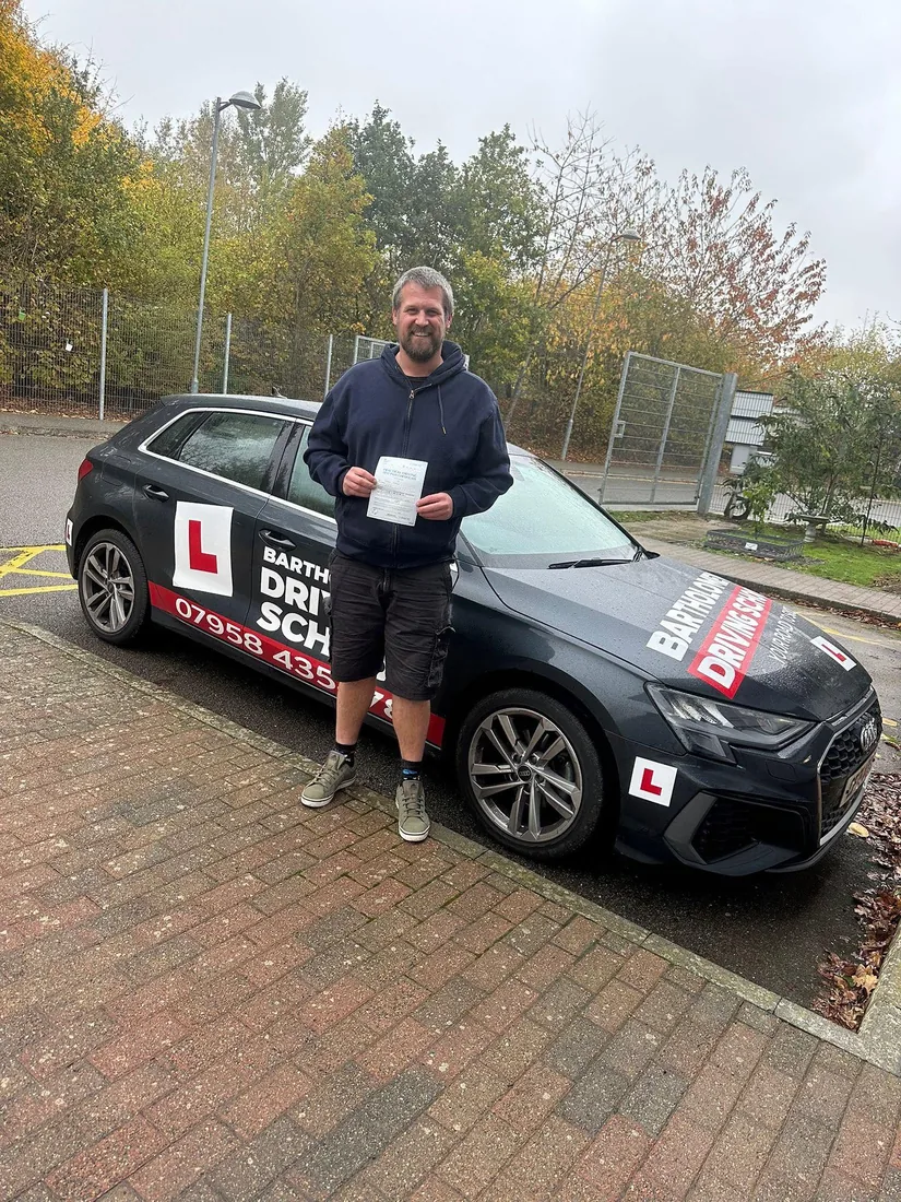 First-time pass photo with the school car
