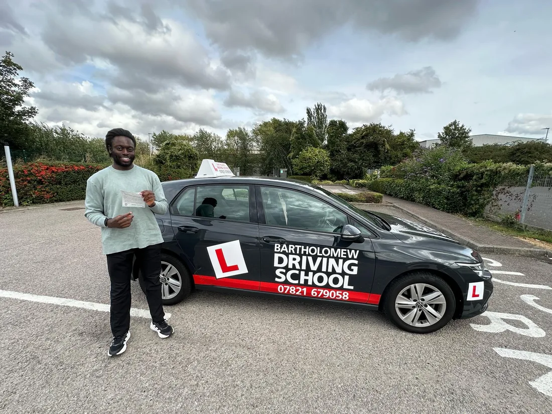 First-time pass photo with the school car