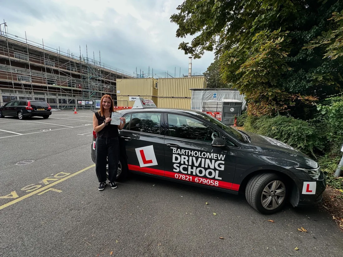 First-time pass photo with the school car