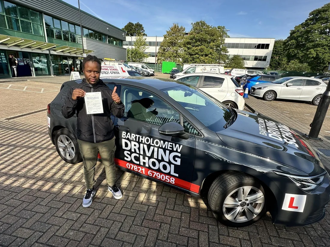 First-time pass photo with the school car