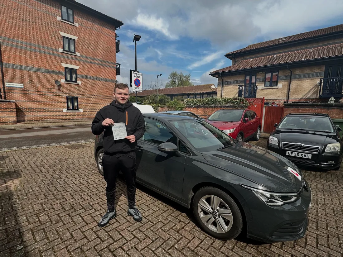 First-time pass photo with the school car